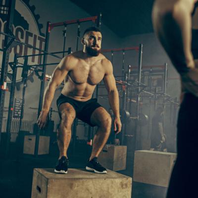 Man Jumping During Exercises Fitness Gym Crossfit